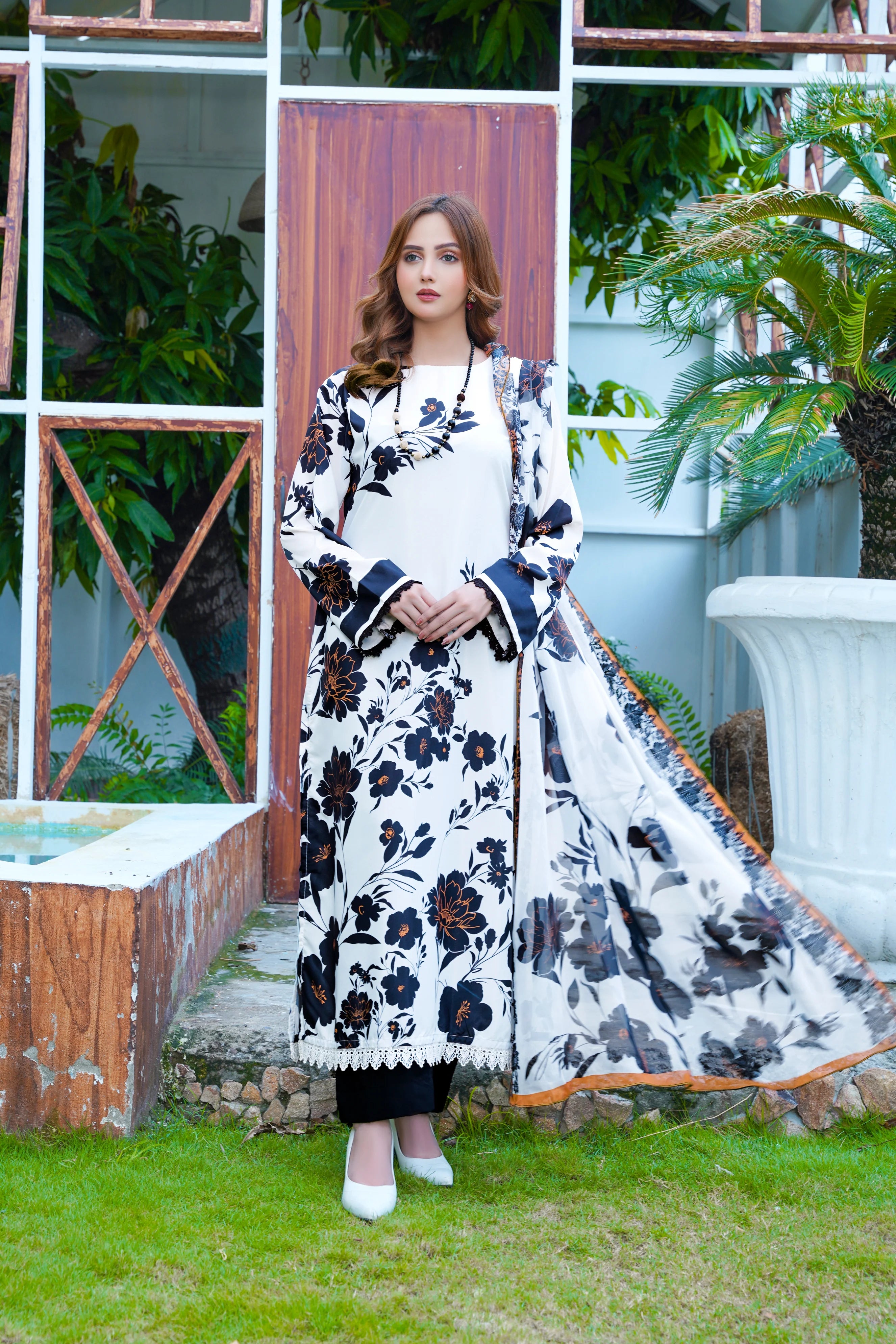 Black and White Long Shirt Featuring Lace Detailing